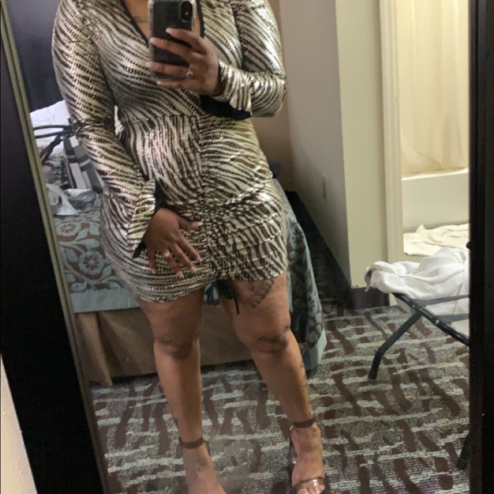 Gold and black party dress. It is a size L.